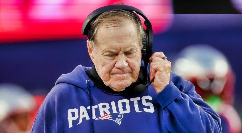 Bill Belichick of New England Patriots looking on during game.