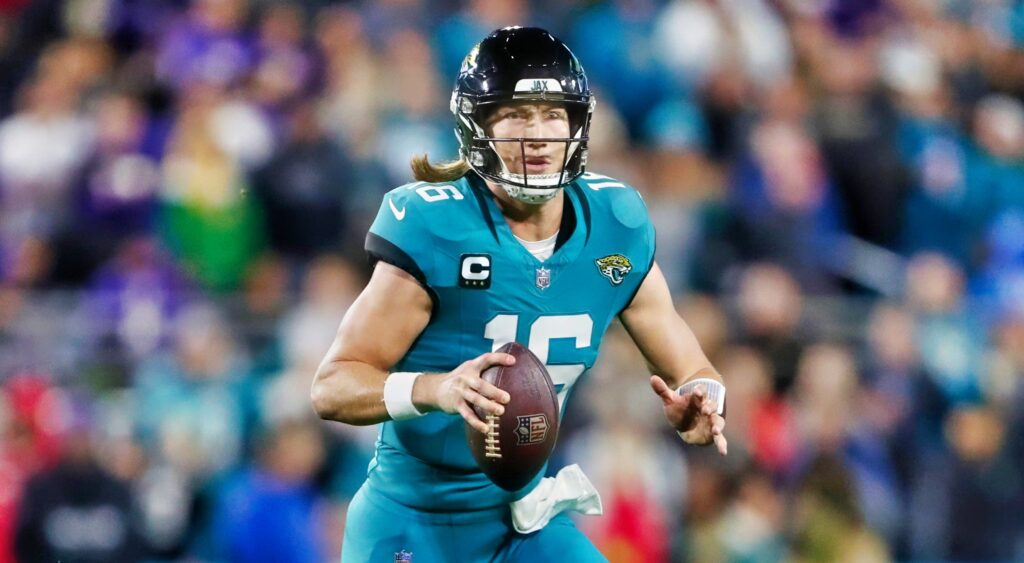 Trevor Lawrence of Jacksonville Jaguars holding football looking to pass.
