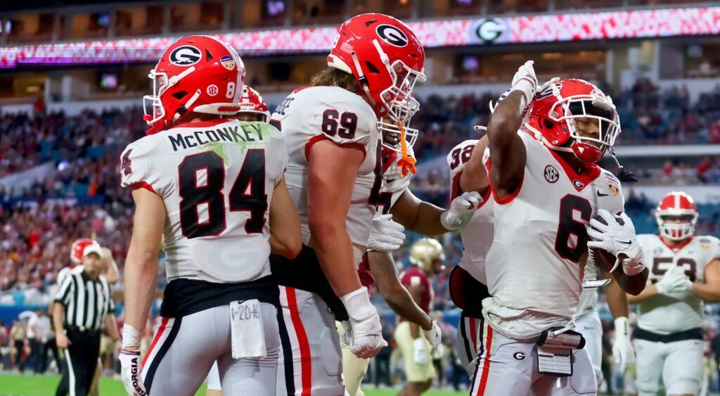 Georgia Bulldogs players celebrating a touchdown.