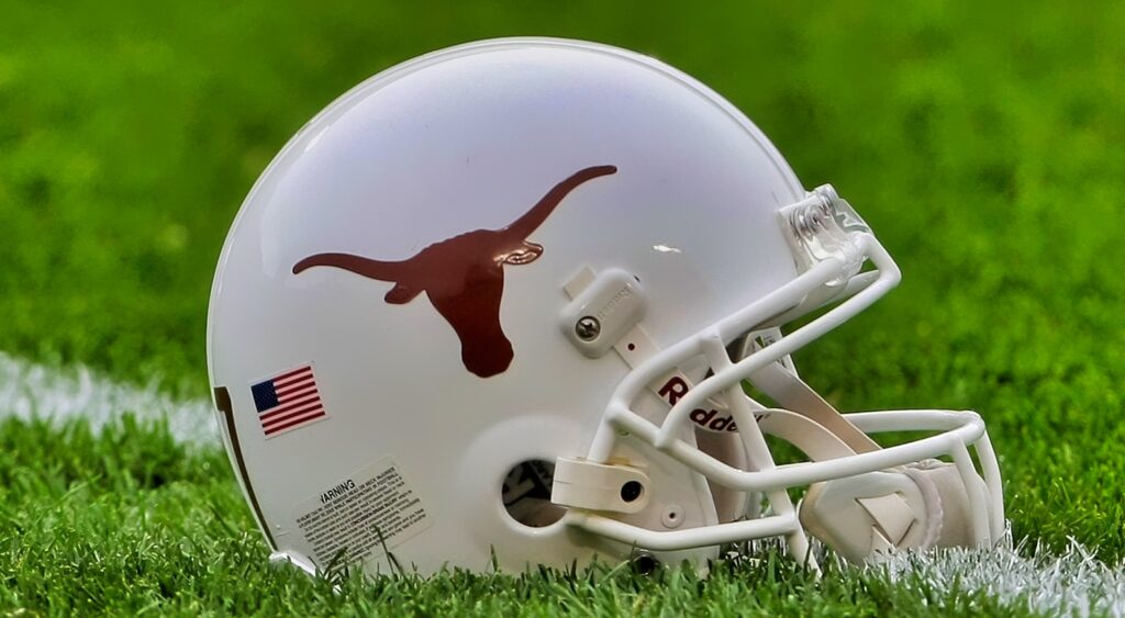 Texas Longhorns helmet shown on field.