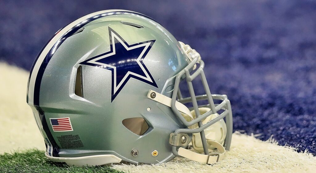 Dallas Cowboys helmet shown on the field.