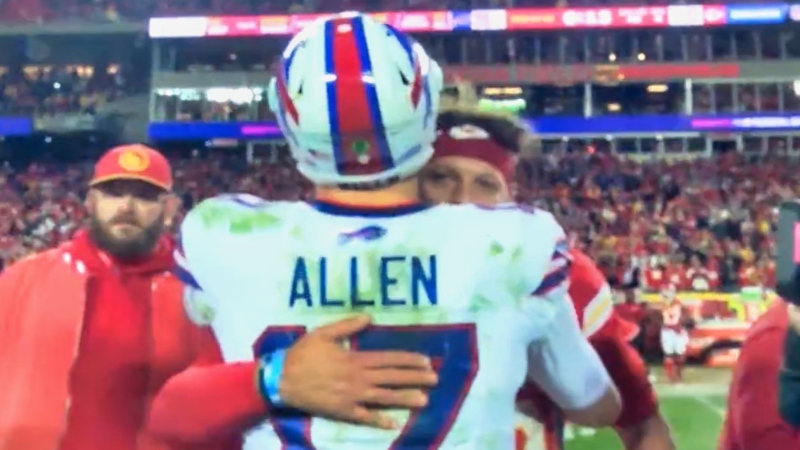 Buffalo Bills quarterback Josh Allen hugging Kansas City Chiefs QB Patrick Mahomes.