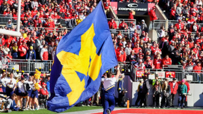 Michigan flag being flown at Ohio State