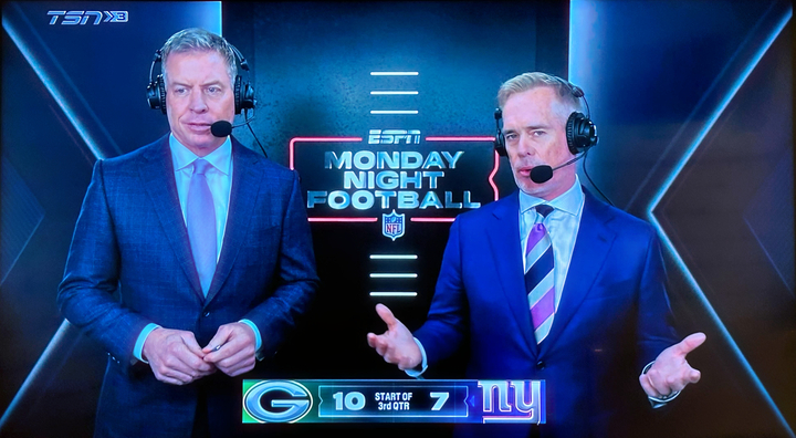 Troy Aikman (left) and Joe Buck (right) speaking during Monday night game.