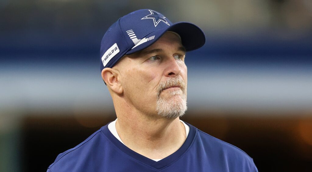 Dallas Cowboys defensive coordinator Dan Quinn looking on.