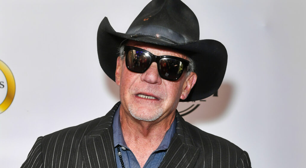 Jim Irsay in hat and shades