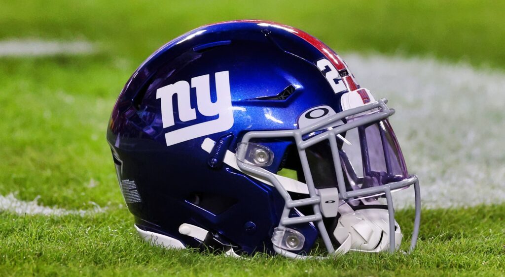Giants helmet on the field.