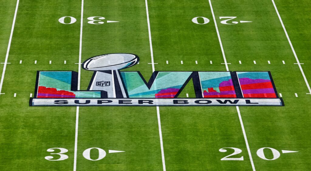 Super Bowl 57 logo shown on field at State Farm Stadium.