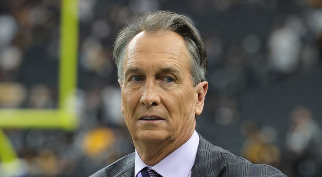 Cris Collinsworth looking on before game.