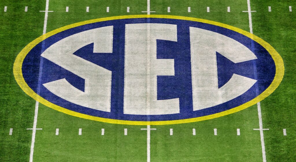 SEC logo on the football field.