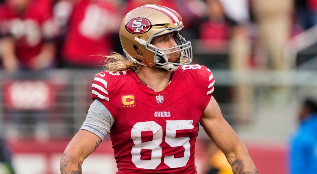 George Kittle of San Francisco 49errs looking on.