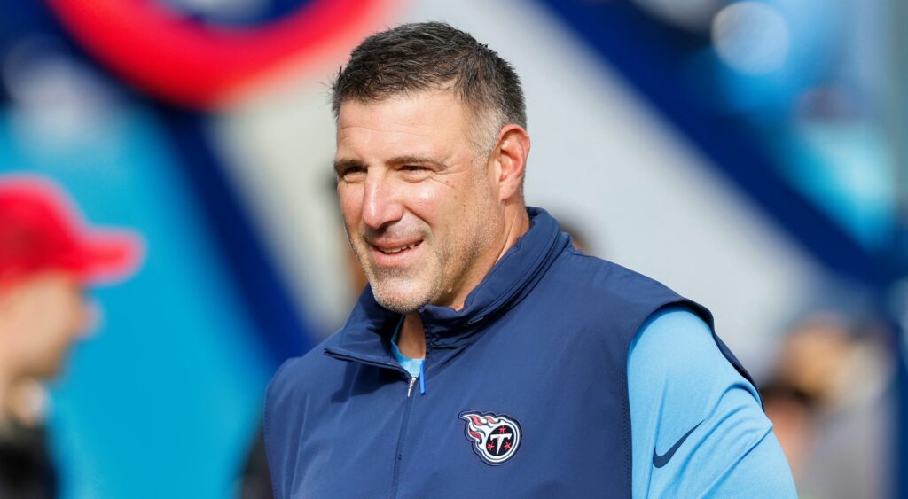 Tennessee Titans head coach Mike Vrabel looking on.
