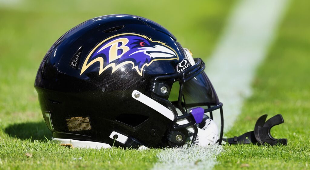 Baltimore Ravens helmet shown on field.