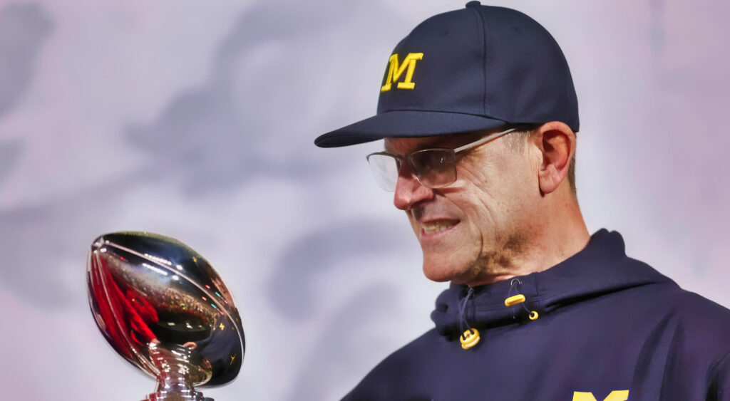 Jim Harbaugh with Leishman Trophy