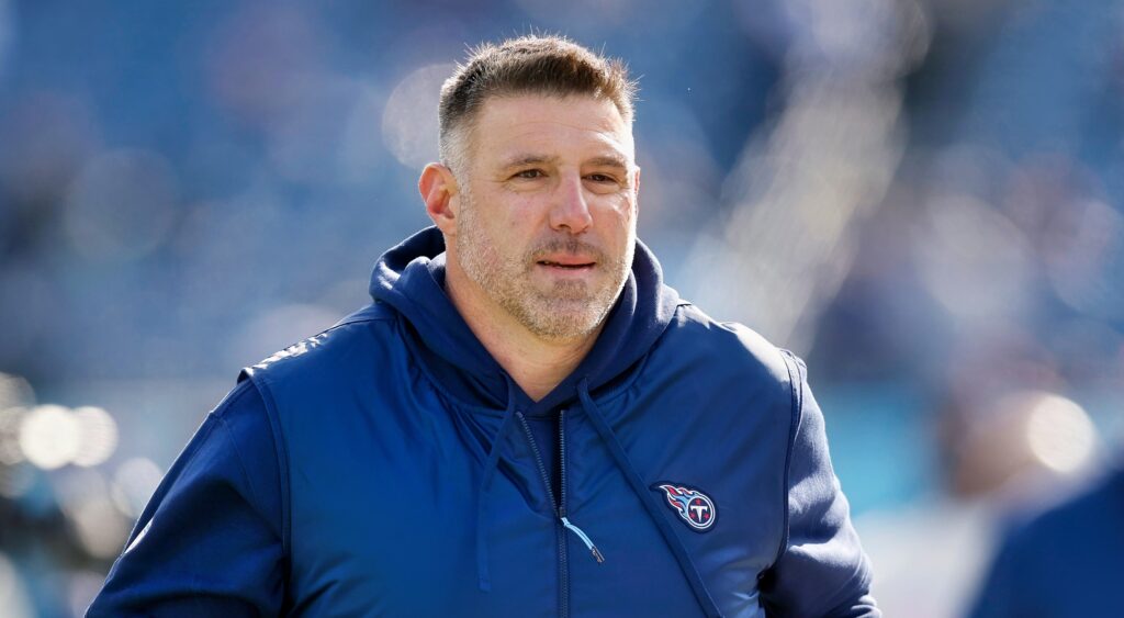 Tennessee Titans head coach Mike Vrabel looking on.