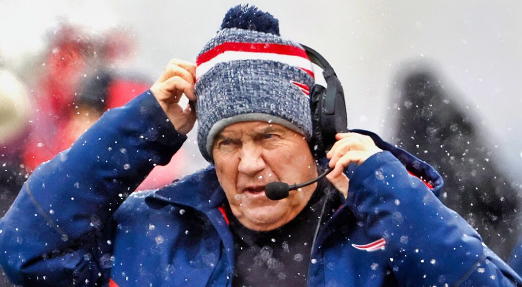 Bill Belichick of New England Patriots looking on during game.