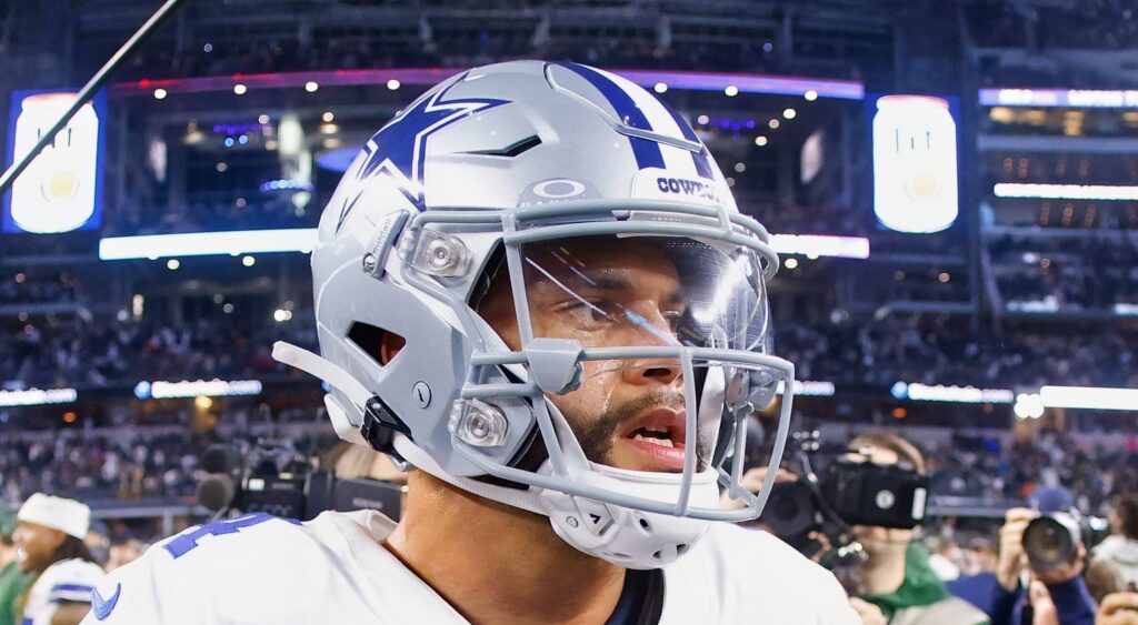 Dallas Cowboys quarterback Dak Prescott looking on after loss.