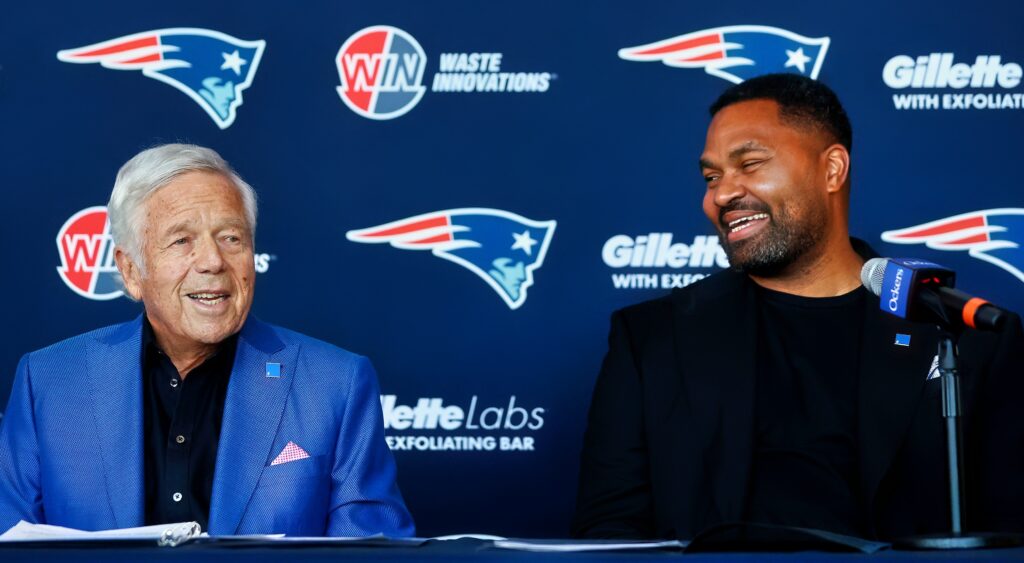 New England Patriots owner Robert Kraft (left) and new head coach Jerod Mayo (right) talking.