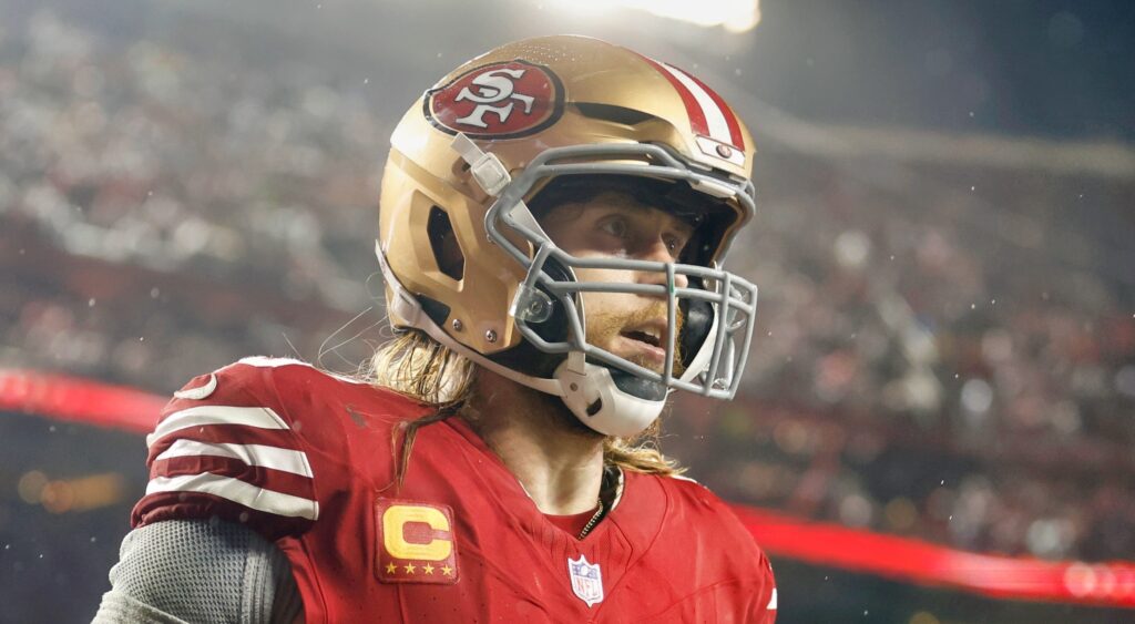 George Kittle of San Francisco 49ers looking on.