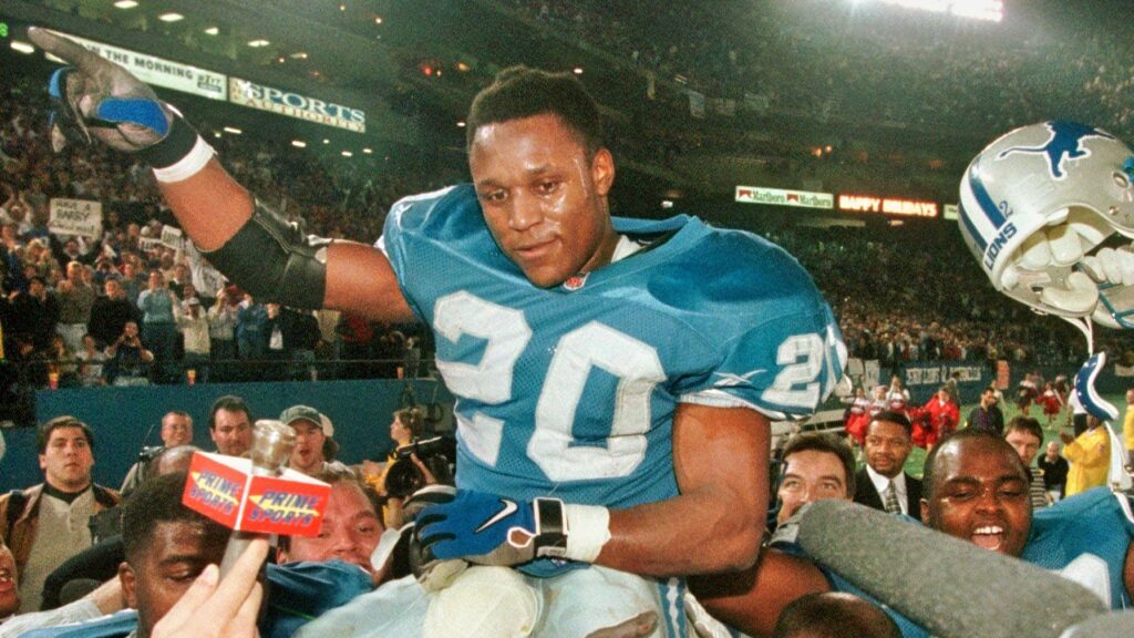 Barry Sanders being carried off after Detroit Lions gmae.