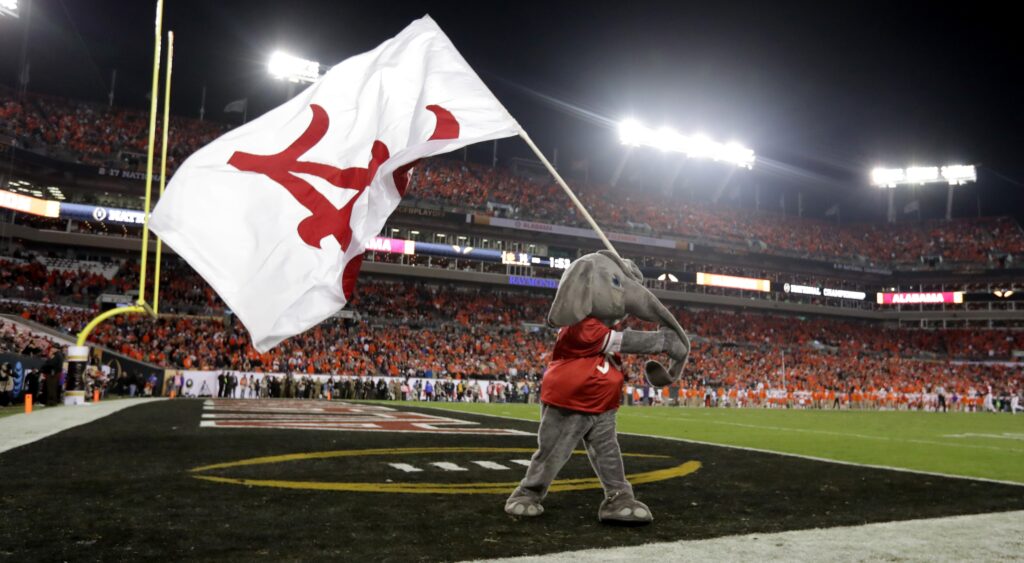 Alabama mascot with flag