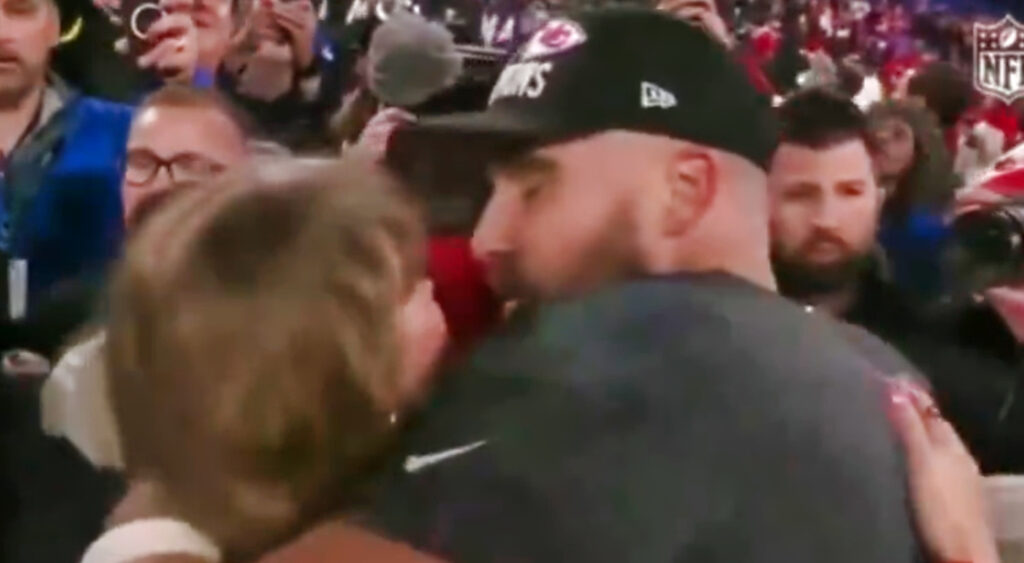 Taylor Swift and Travis Kelce hugging