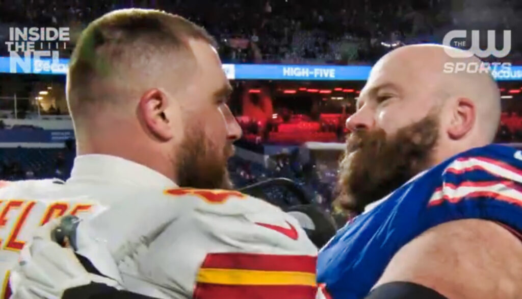 Travis Kelce and Mitch Morse sharing an embrace