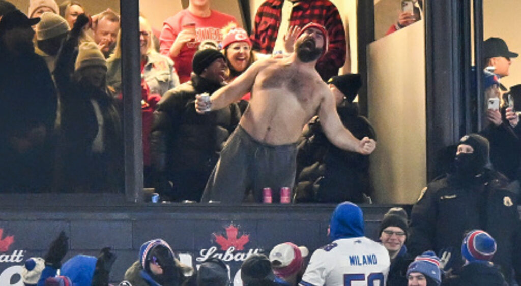 A shirtless Jason Kelce celebrating