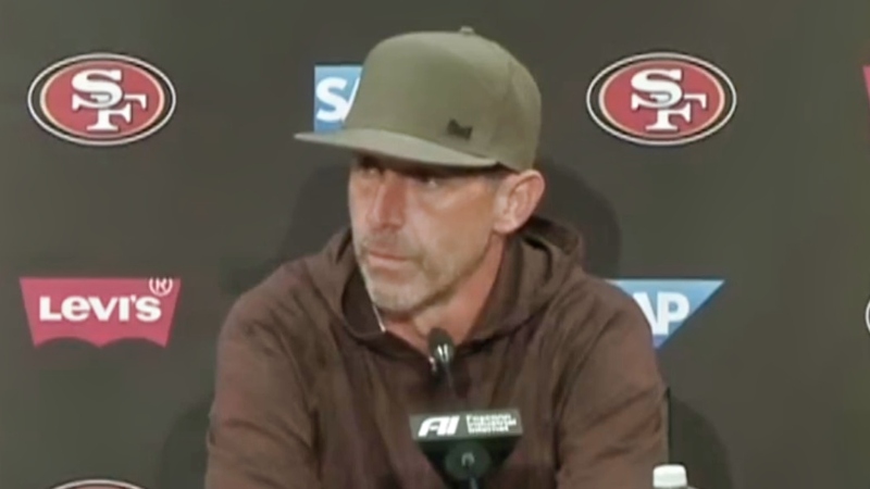 San Francisco 49ers head coach Kyle Shanahan speaking to reporters.