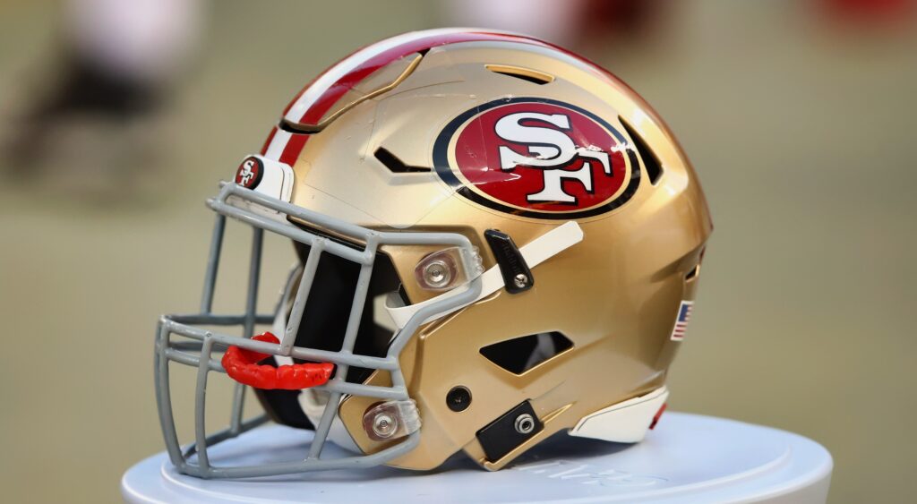San Francisco 49ers helmet shown on sideline.