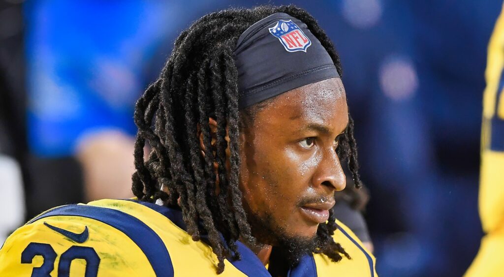 Los Angeles Rams running back Todd Gurley looking on.