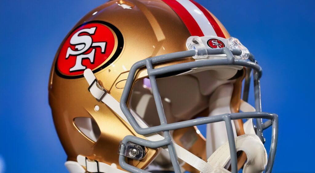 49ers helmet at press conference.
