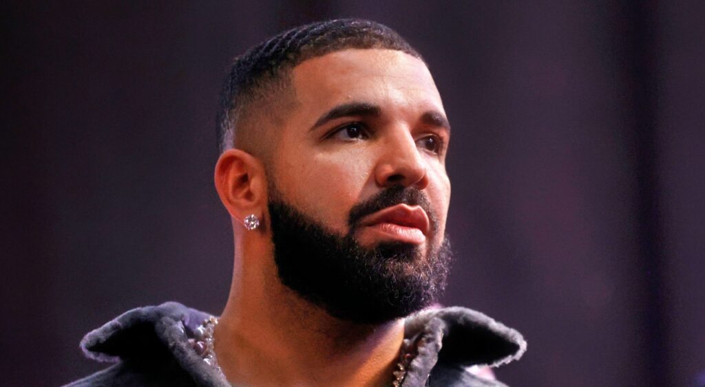 Drake looking on at event in Long Beach, California.