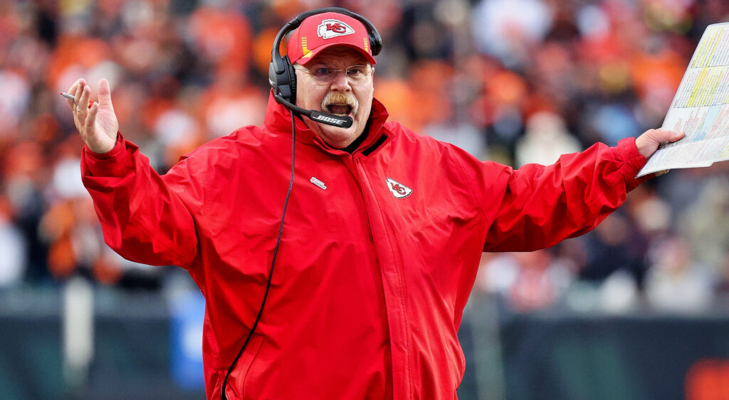 Andy Reid holding his hands in the air