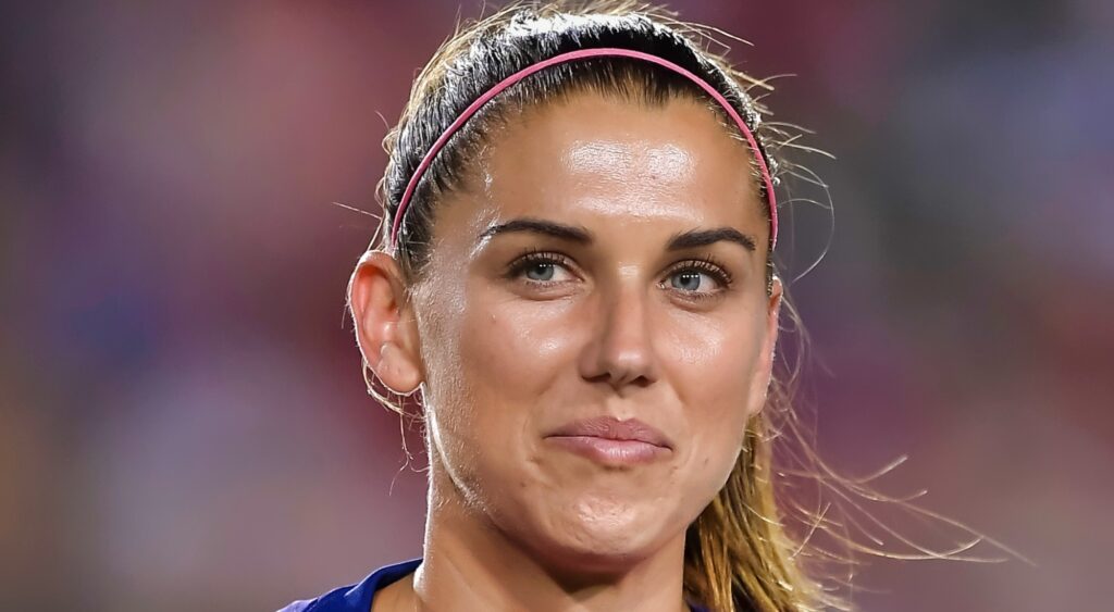 Alex Morgan looks on during a game.