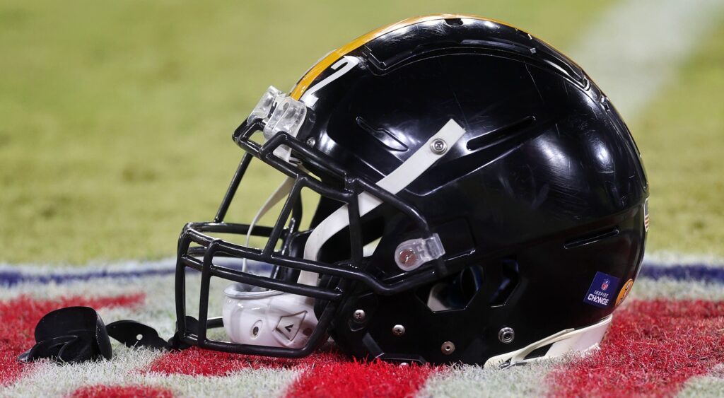 Pittsburgh Steelers helmet shown on field.