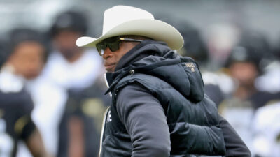 Deion Sanders in coat and cowboy hat