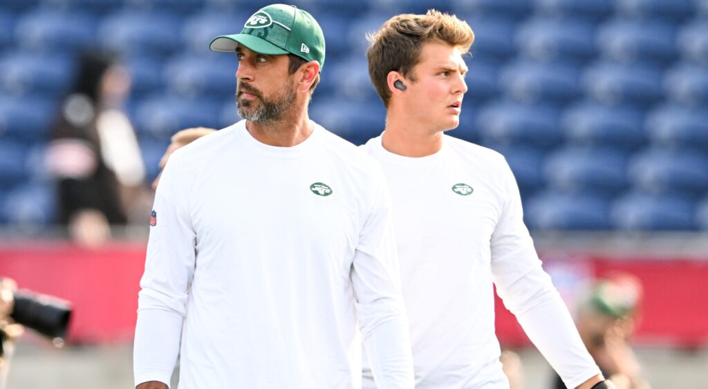Aaron Rodgers and Zach Wilson in Jets shirt