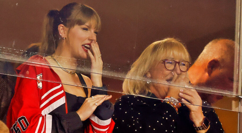 Taylor Swift standing next to Donna Kelce