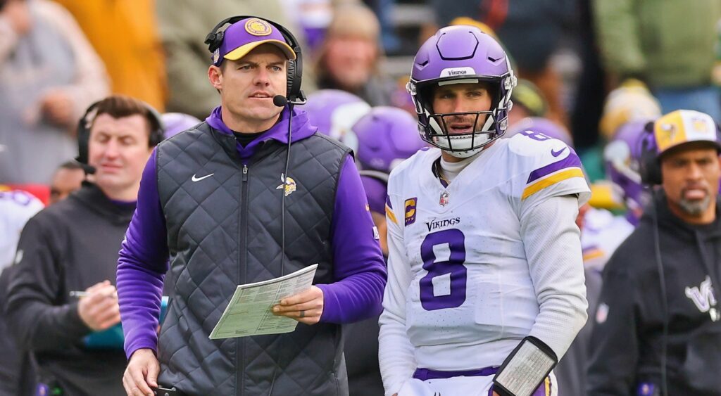 Kevin O'Connell (left) and Kirk Cousins (right) of Minnesota Vikings looking on.