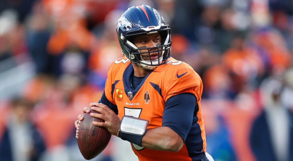 Russell Wilson of Denver Broncos looking to pass.
