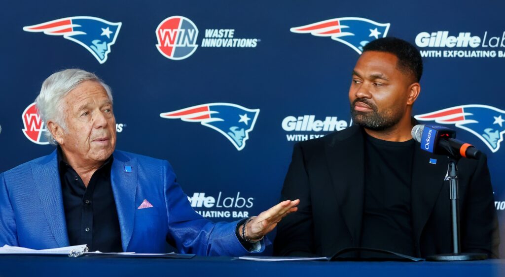 New England Patriots owner Robert Kraft (left) and new head coach Jerod Mayo (right) talking.