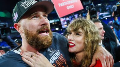Travis Kelce and taylor Swift hugging