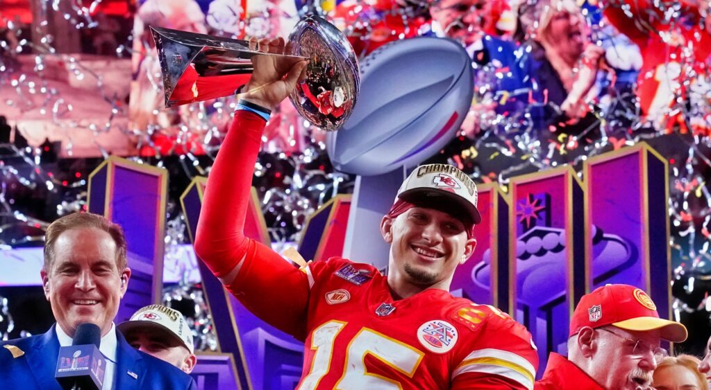 Patrick Mahomes of Kansas City Chiefs holding Super Bowl trophy.