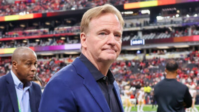 Roger Goodell walking out to field before Super Bowl 58