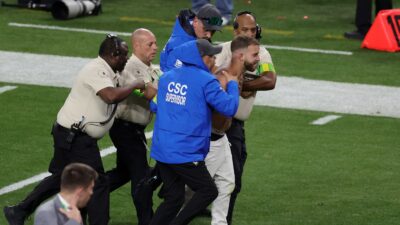 Super Bowl streaker being arrested at Super Bowl