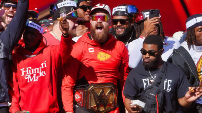 Travis Kelce shouting at Chiefs victory parade