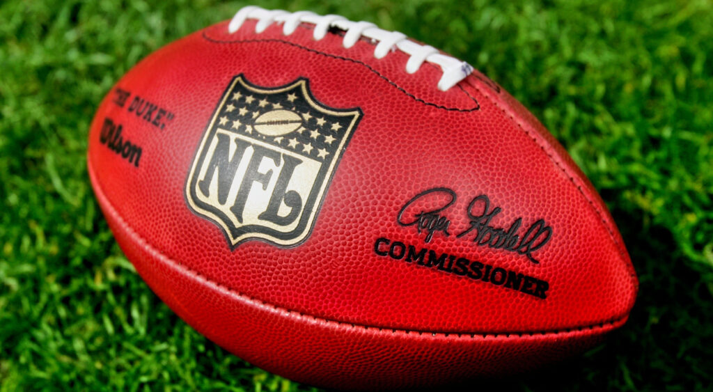 NFL ball on grass