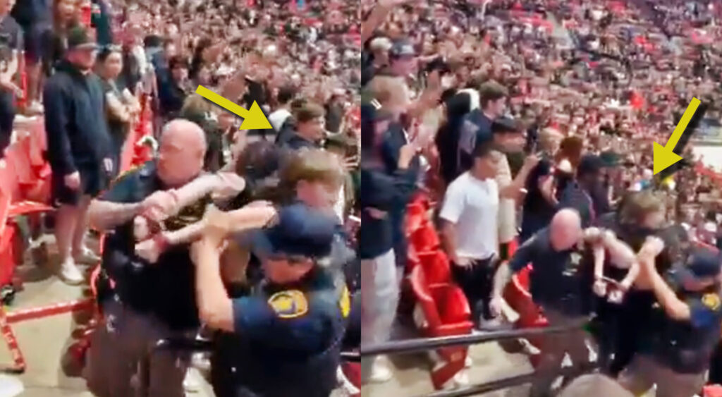 Photos of fan being carried out of basketball game by police