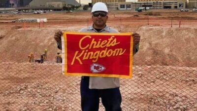 Kansas City Chiefs fan holding up flag